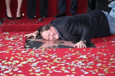 皮克斯掌舵人约翰·拉塞特（John Lasseter）留名好莱坞星光大道